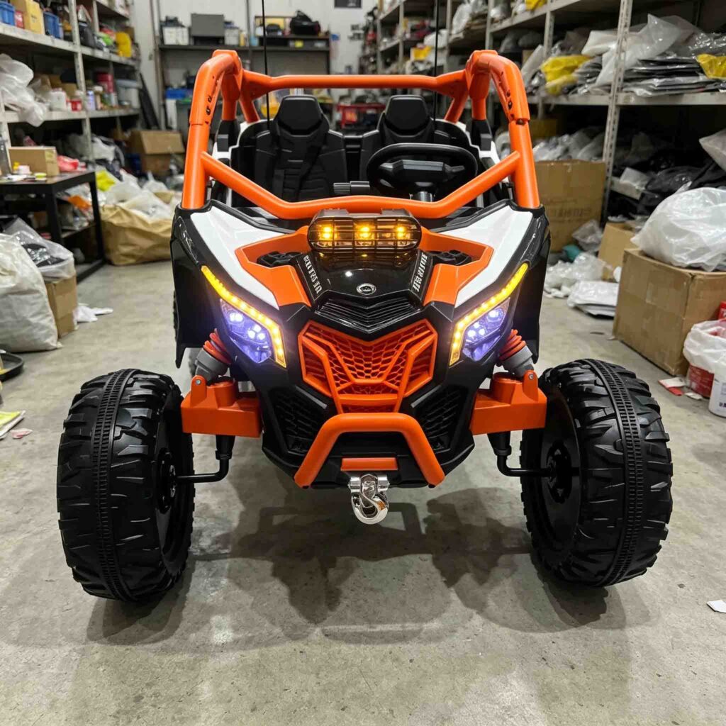 Orange kids electric UTV front view with LED headlights